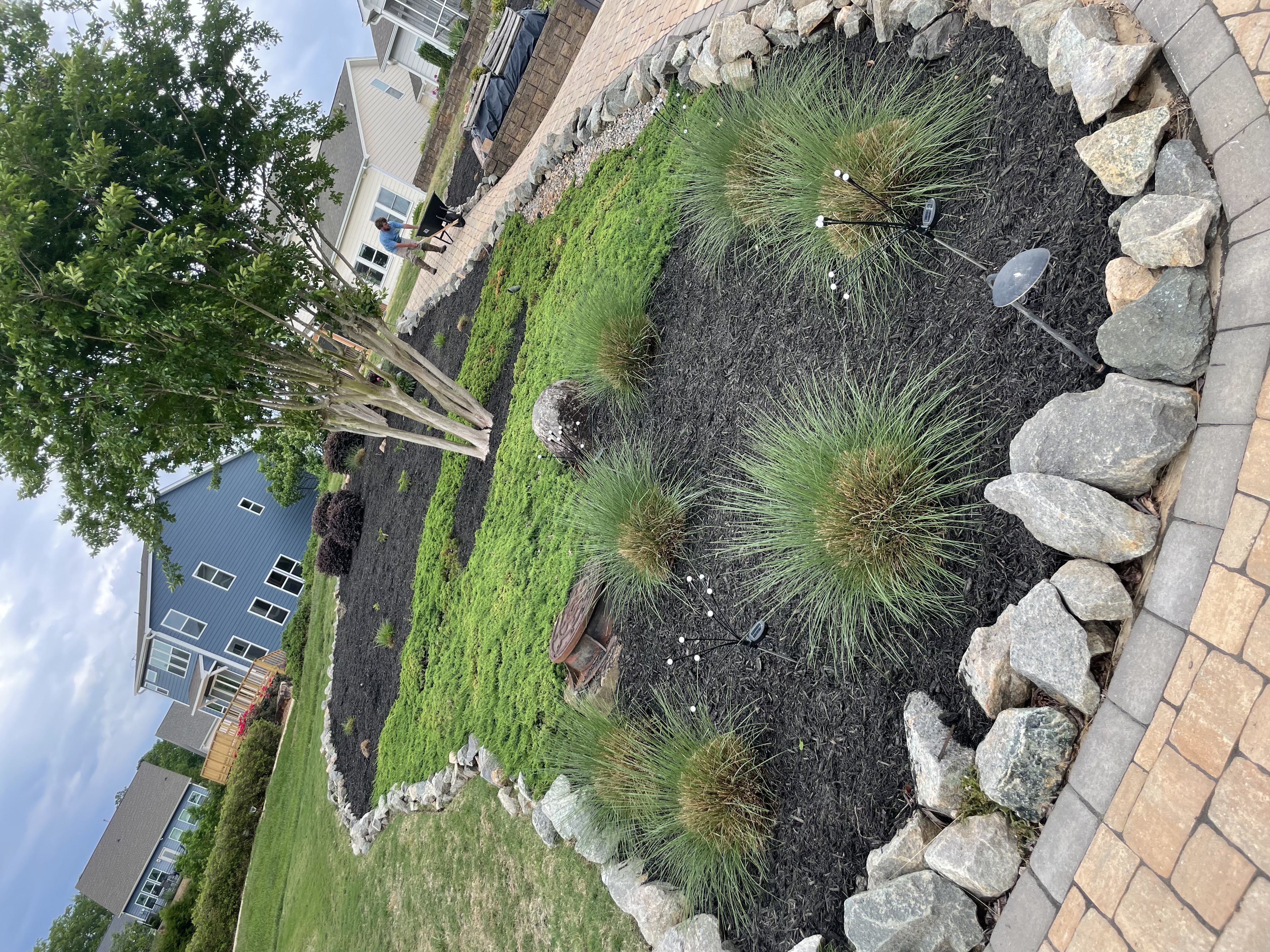 Liberty Landscaping and Design team working on a garden project