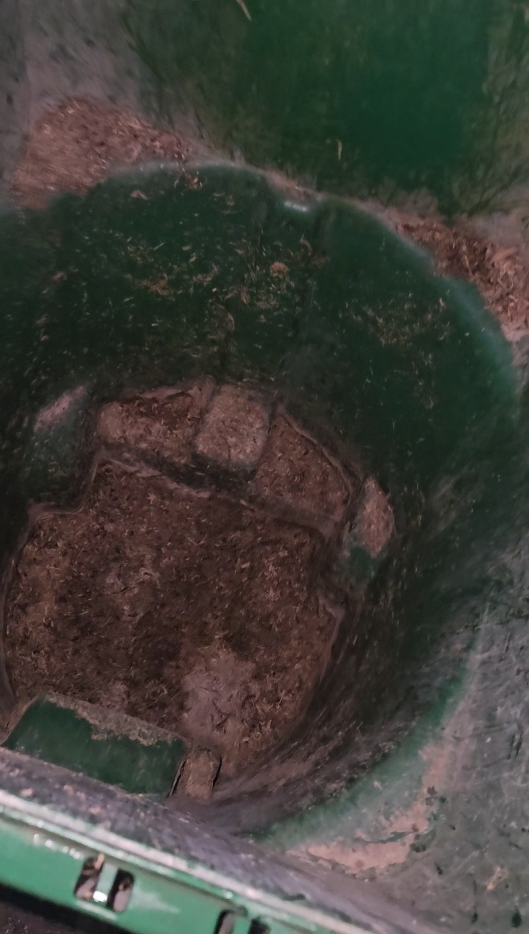 Dirty trash bin before cleaning