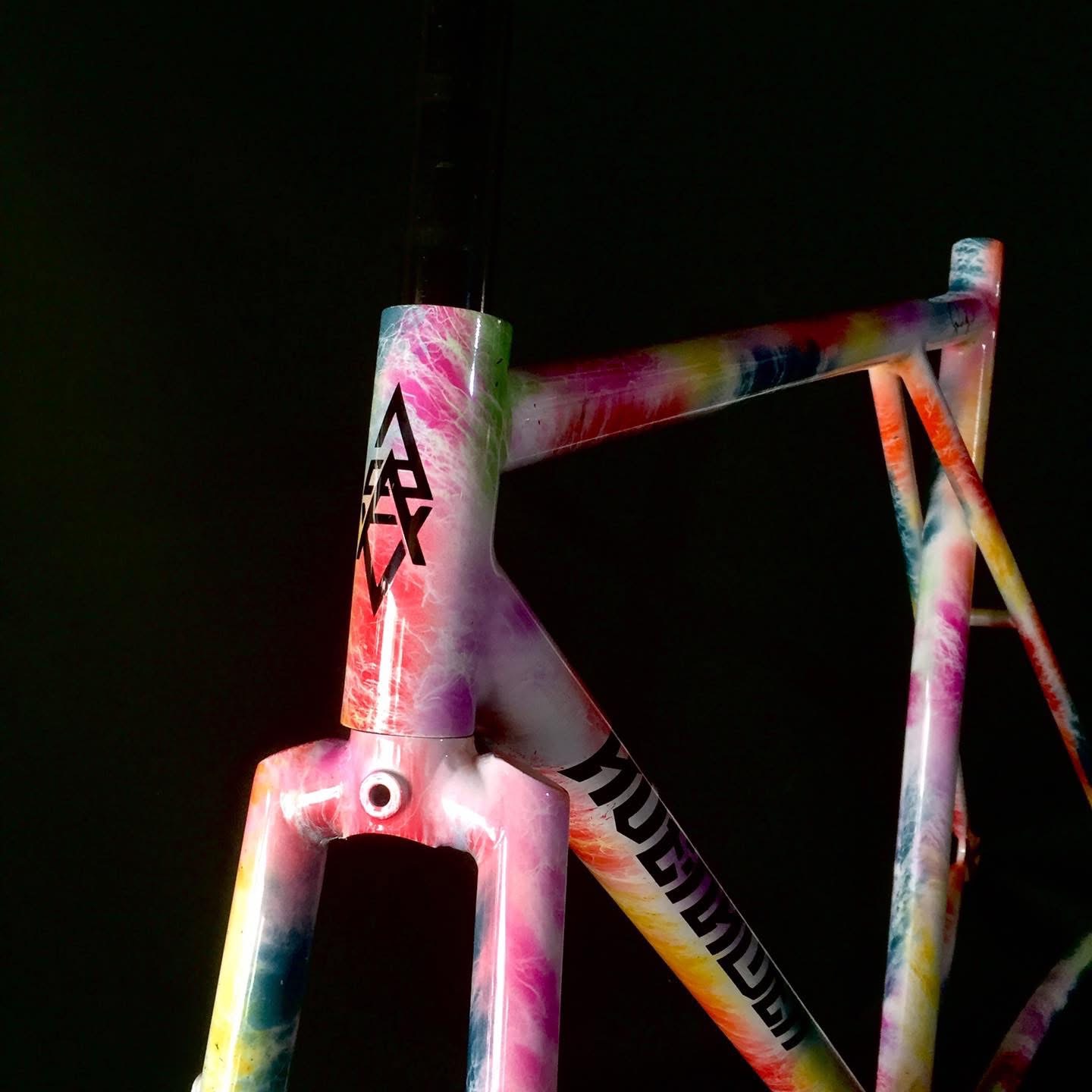 Custom painted bicycle frame in a studio